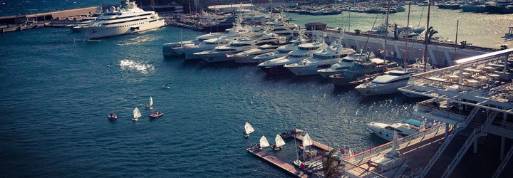 Sailing school. Monaco. Optimist sailing.